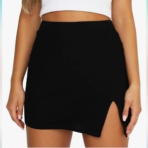 Black tight mini skirt with slit